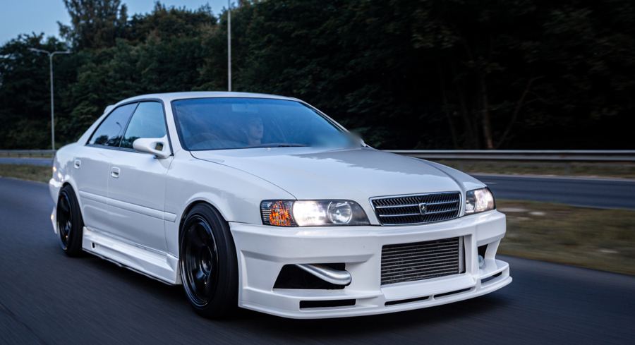Toyota Chaser on the move, three-quarter view at dusk