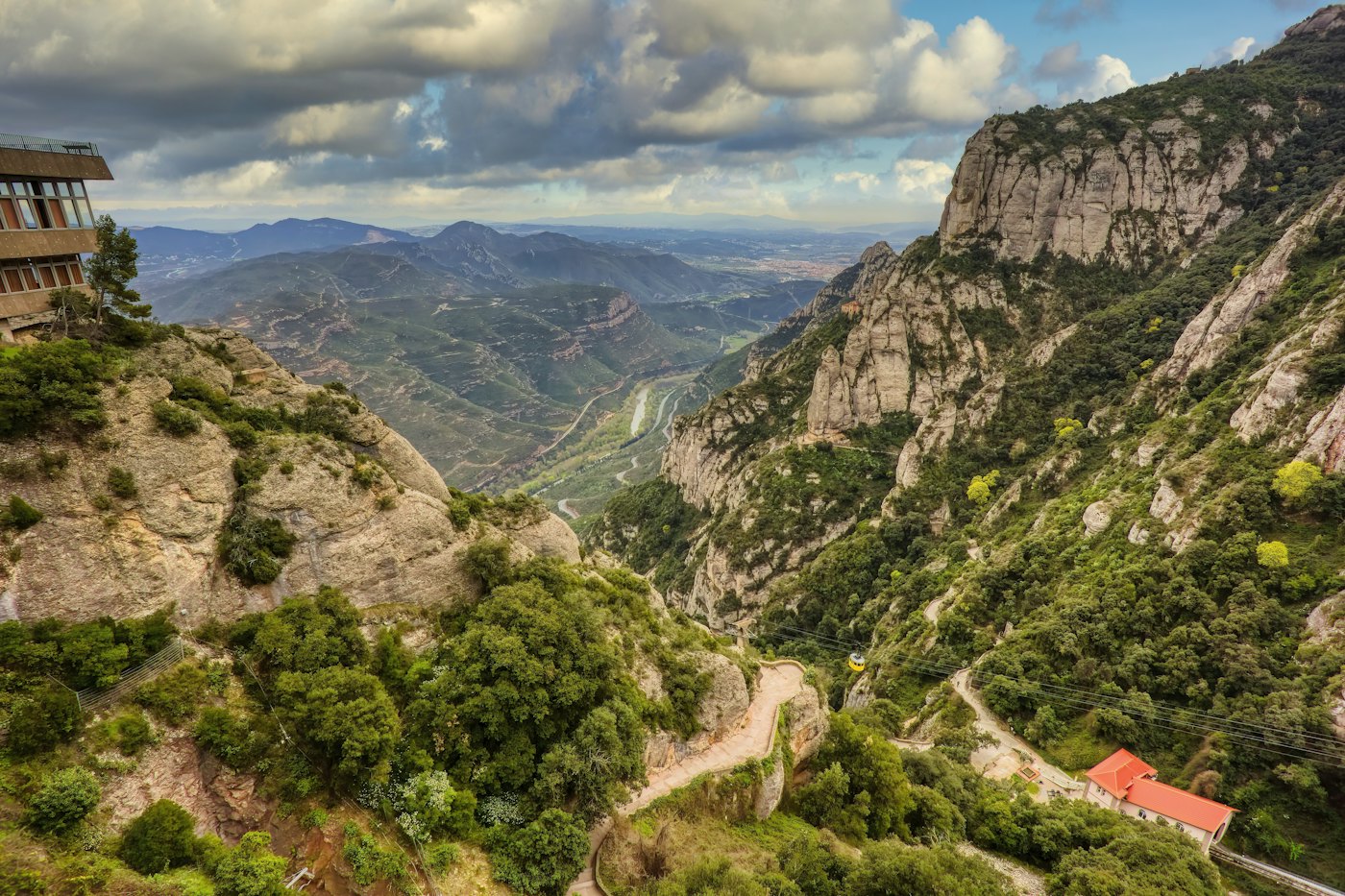 A mountain road winding through the Montserrat valley