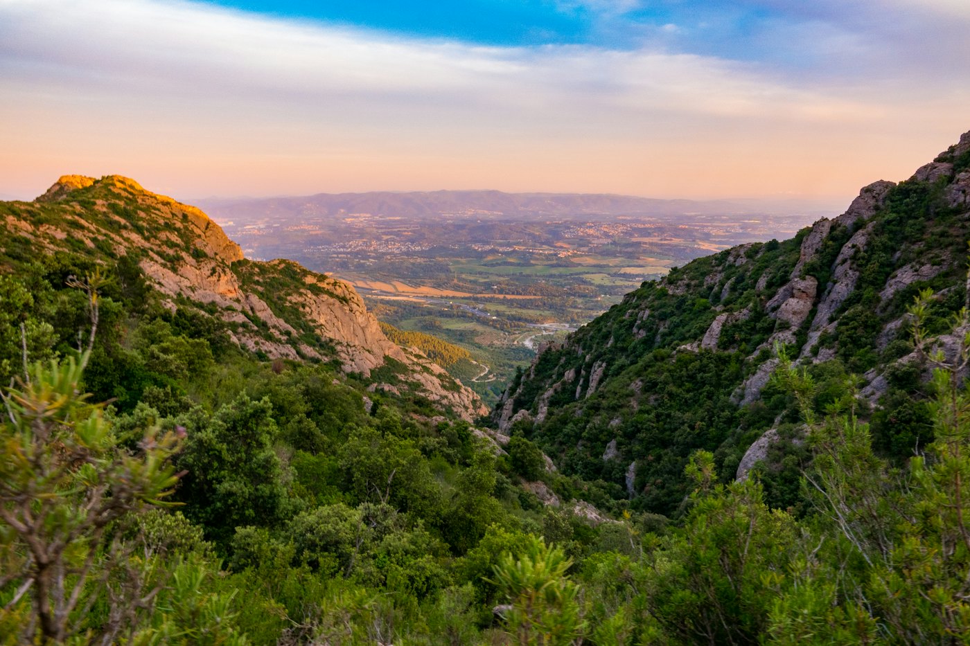 The valley below Montserrat at sunset