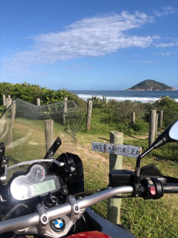 Motorcycle parked on a Rio de Janeiro beach front