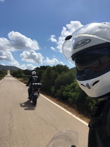 Rider on tarmac leaving the Sierra de Grazalema, southern Spain